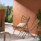 outdoor CHAIR with an earthy wicker finish